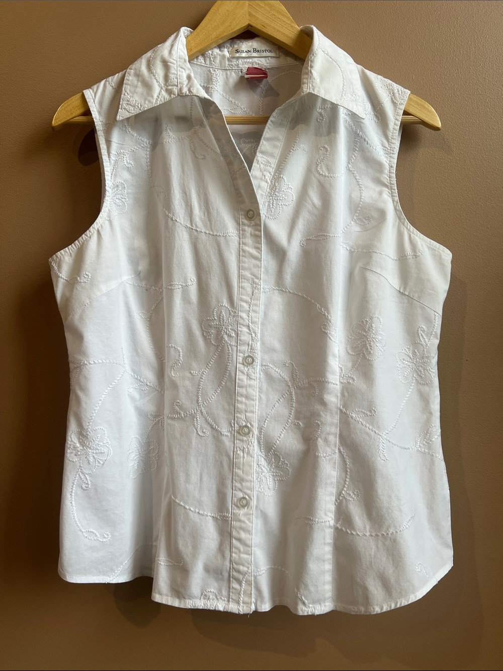 Vintage White sleeveless button up blouse with muted, floral embroidery